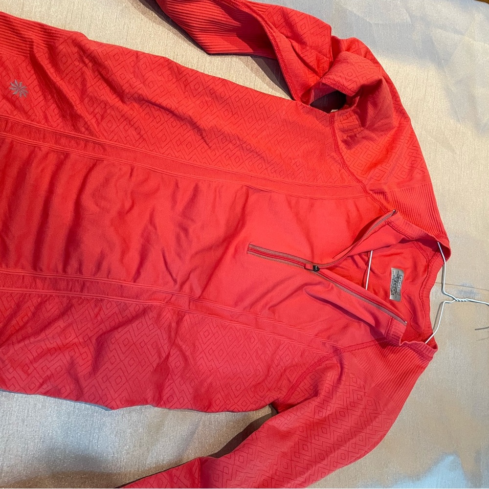 Athleta salmon orange Lycra athletic top.